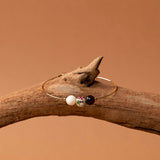 Bracelet jonc Djerba - grenat, céramique fleurie et pierre de lune, plaqué or 24K, fait main en France
