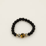 Bracelet perles Fitz Roy - onyx noir et jaspe dalmatien, perle dorée centrale, fait main en France