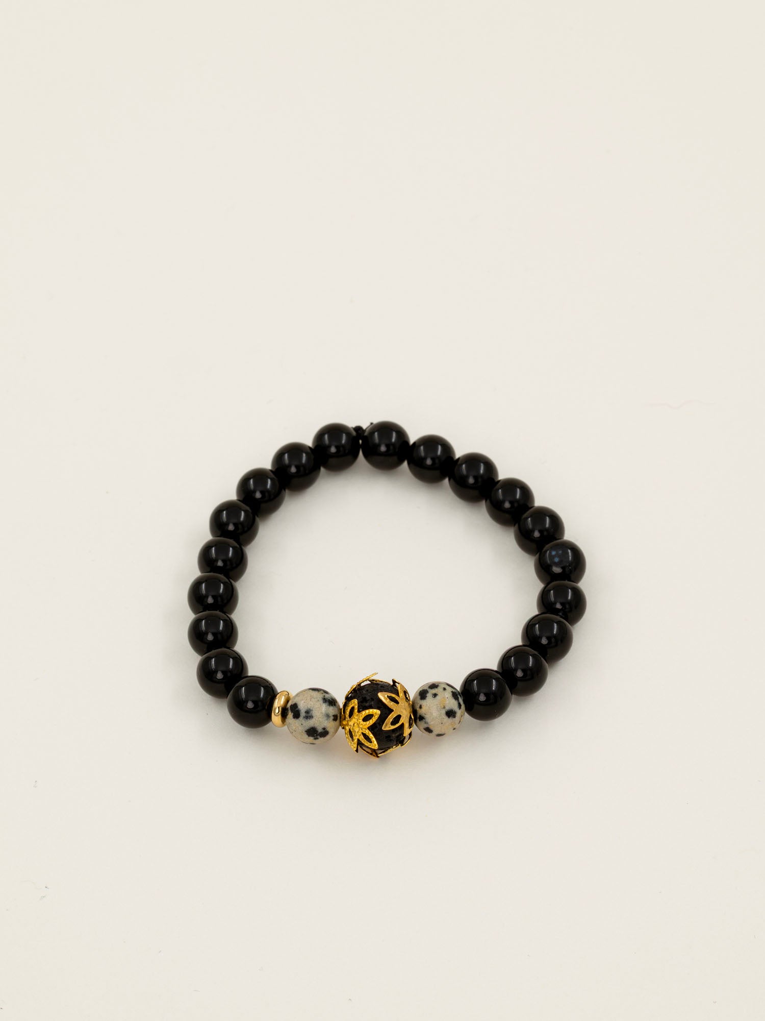 Bracelet perles Fitz Roy - onyx noir et jaspe dalmatien, perle dorée centrale, fait main en France