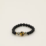 Bracelet perles Fitz Roy - onyx noir et jaspe dalmatien, perle dorée centrale, fait main en France