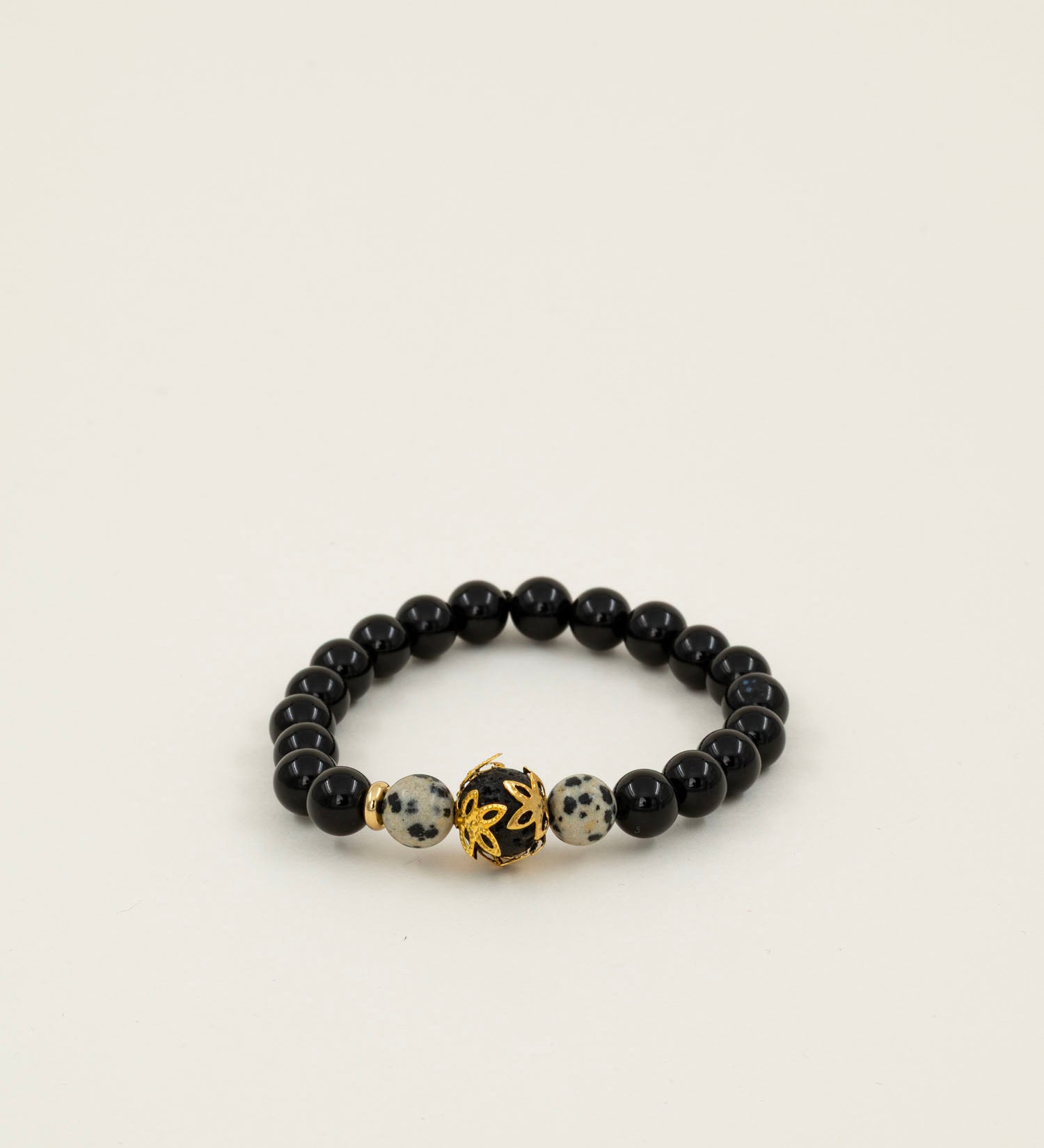 Bracelet perles Fitz Roy - onyx noir et jaspe dalmatien, perle dorée centrale, fait main en France