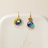 Boucles d'oreilles Niamey, disque wax violet turquoise et vert anis, anneau laiton torsadé brut